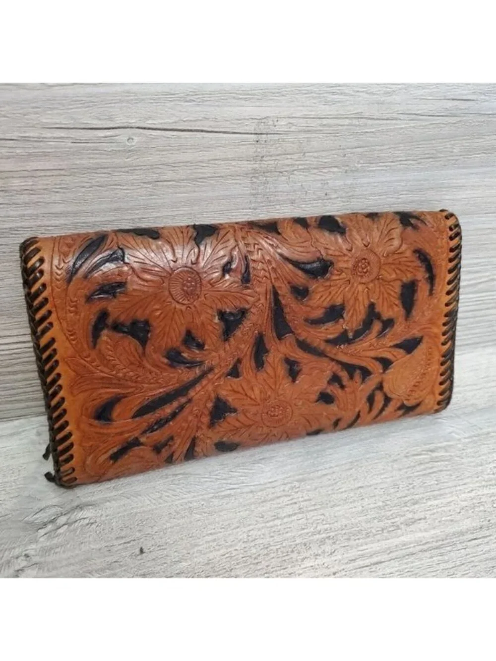 Vintage tooled leather turn lock wallet
